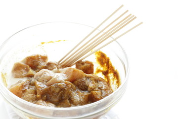 raw chicken cube and spice for Satay cooking image