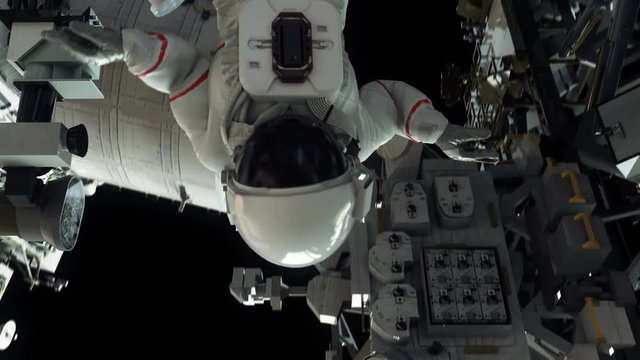 An astronaut on a spacewalk at the International Space Station. Highly realistic 4K animation.