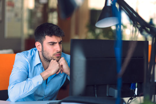 Freelance programmer working in startup office