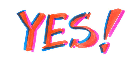 Word "yes" painted in bright neon felt highlighter pen on clean white background