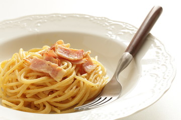 italian food, bacon and egg mixed pasta