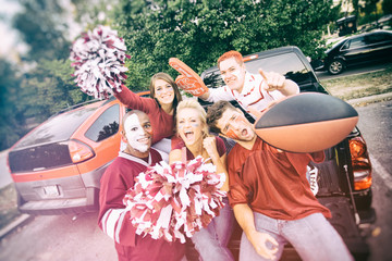 Tailgating: Group Of College Students Excited For Football Game