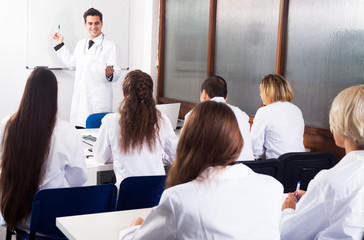 interns at lecture at university