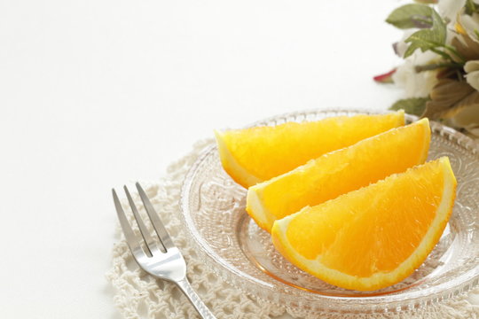 freshness orange on glass plate for healthy dessert image