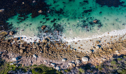 Clear ocean rolling onto the beach