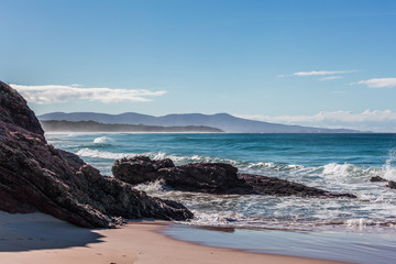 Ocean beach and rocks at Mallacoota Coastal Reserve, Australia