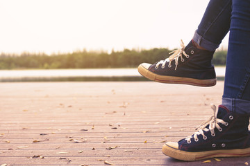Feet of hipster women in park and nature background, Relax time on holiday