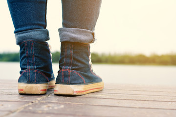Feet of hipster women in park and nature background, Relax time on holiday