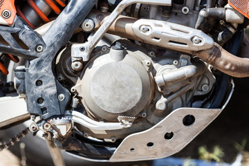 Close-up of muddy engine of dirt motorcycle