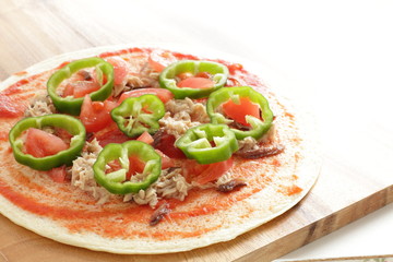 prepared pizza ready for baking