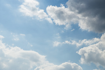In the sky there are big fluffy clouds