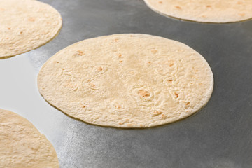 Unleavened tortillas on kitchen table