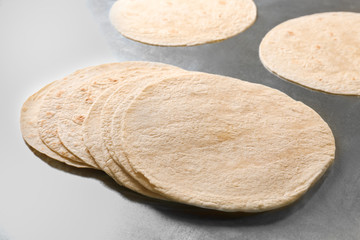 Unleavened tortillas on kitchen table