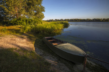 Fototapeta premium Boat on the riverside
