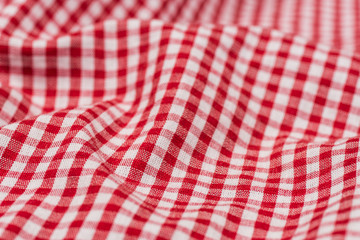 Checkered tablecloth kitchen selective focus.
