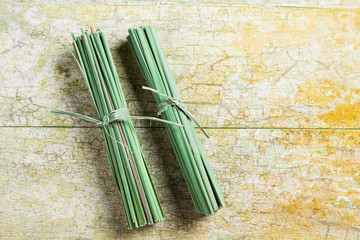 Fresh lemon grass on wood background