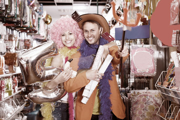 man and woman getting ready for a carnival