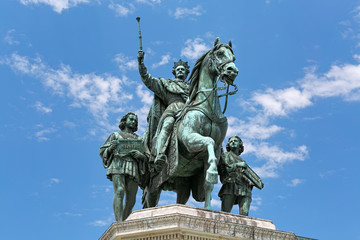 Equestrian statue of Ludwig I, king of Bavaria on the Odeonsplatz in Munich, Germany. The statue was unveiled in 1862. Two boys near the rider hold the plaques with words "Justice" and "Persistence".