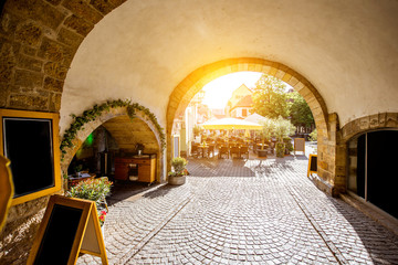 Street view under the church on the Merchants bridge in Erfurt, Germany