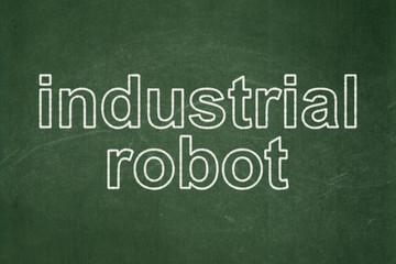 Fototapeta premium Manufacuring concept: Industrial Robot on chalkboard background