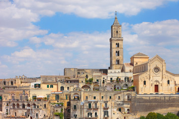 Fototapeta na wymiar Beautiful Matera view of historical sassi and cathedral on the right side