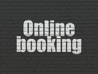 Fototapeta na wymiar Travel concept: Online Booking on wall background