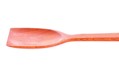 Wooden spatula on a white background