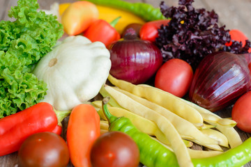 Vegetables on vintage wood background - autumn harvest. Rural still life