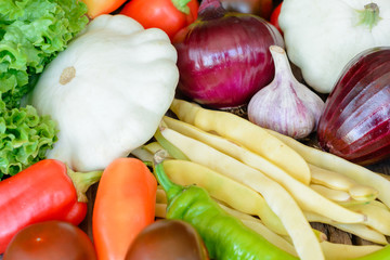 Vegetables on vintage wood background - autumn harvest. Rural still life