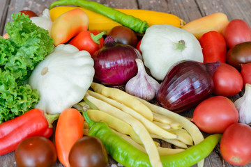 Vegetables on vintage wood background - autumn harvest. Rural still life
