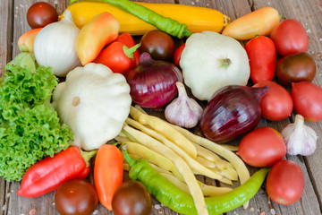 Vegetables on vintage wood background - autumn harvest. Rural still life