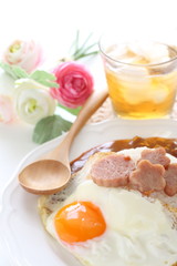 Hawaiian food, luncheon meat and sunny side up fried egg on rice