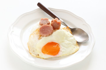 Hawaiian food, luncheon meat and sunny side up fried egg on rice