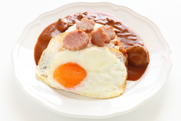 Hawaiian food, luncheon meat and sunny side up fried egg on rice