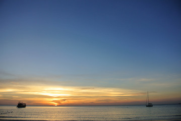 Fishing boat in sunset