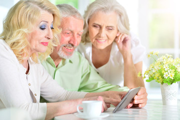 senior people using digital tablet