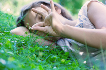 Thoughtful girl is in the field