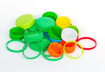 Recycle  plastic caps waste isolated on white background