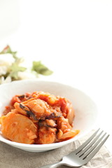 Italian food, octopus and tomato simmered