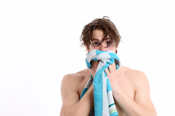 Guy with striped blue towel and strong body on white