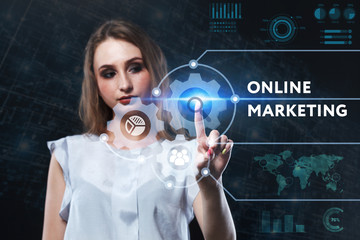 The concept of business, technology, the Internet and the network. A young entrepreneur working on a virtual screen of the future and sees the inscription: Online marketing