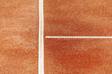 White lines on a clay tennis courts