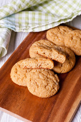 Oatmeal cookies on a wooden desk