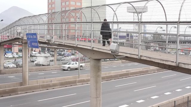 People crossing highway platform