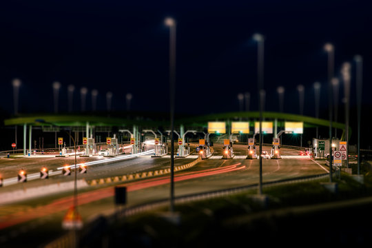 highway toll booth at night - tilt shift effect
