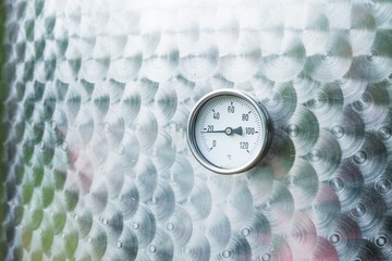manometer of a chrome wine barrel
