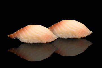 Japanese cuisine. Sushi nigiri over black background.