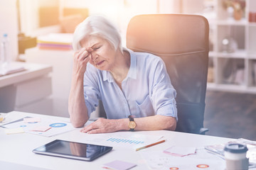 Exhausted senior woman feeling tired