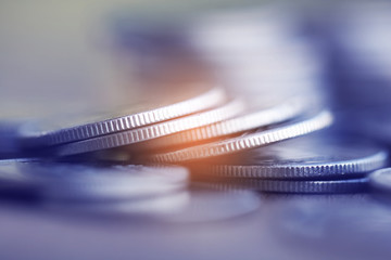 Row of coins on wood background for finance and Saving concept,Investment, Economy, Soft focus and dark style.