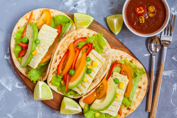 Vegetarian fajitas with tofu and vegetables. Love for a healthy vegan food concept.